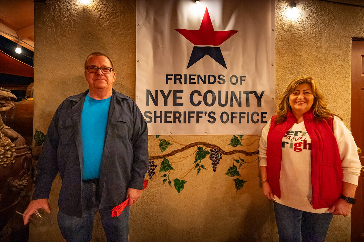 Nye County Sheriff Joe McGill and Friends of Nye County Sheriff’s Office President Tammy Enge ...