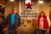 Nye County Sheriff Joe McGill and Friends of Nye County Sheriff’s Office President Tammy Enge ...