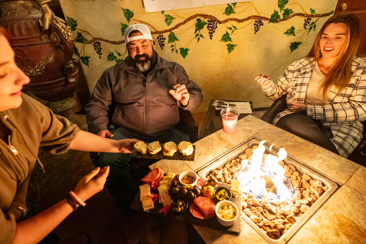 The event was held at Artesian Cellars. Many of the attendees enjoying Artesian Cellars’ hand ...