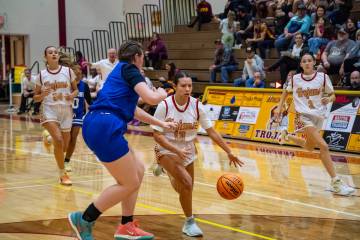 Pahrump Valley High School junior guard Autumn Colon breezes past a Coral Academy of Science La ...