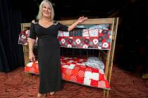 Nye County Sleep in Heavenly Peace President Carmen Murzyn poses before a sample of a bunk bed ...