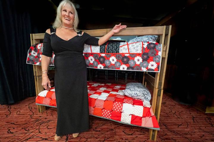 Nye County Sleep in Heavenly Peace President Carmen Murzyn poses before a sample of a bunk bed ...
