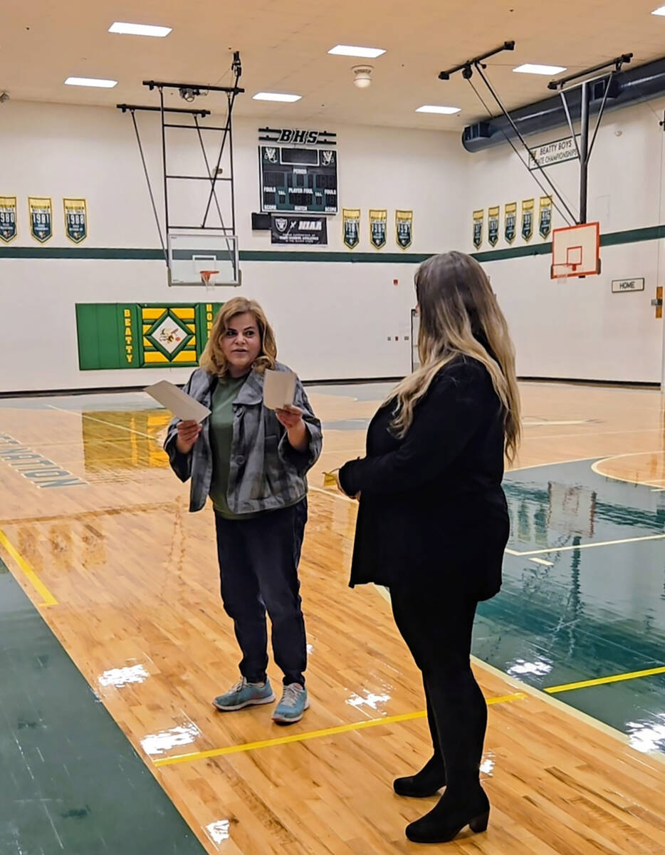 Beatty VFW General Manager Carlotta Marinaro (left) presents the donation to Beatty High teache ...