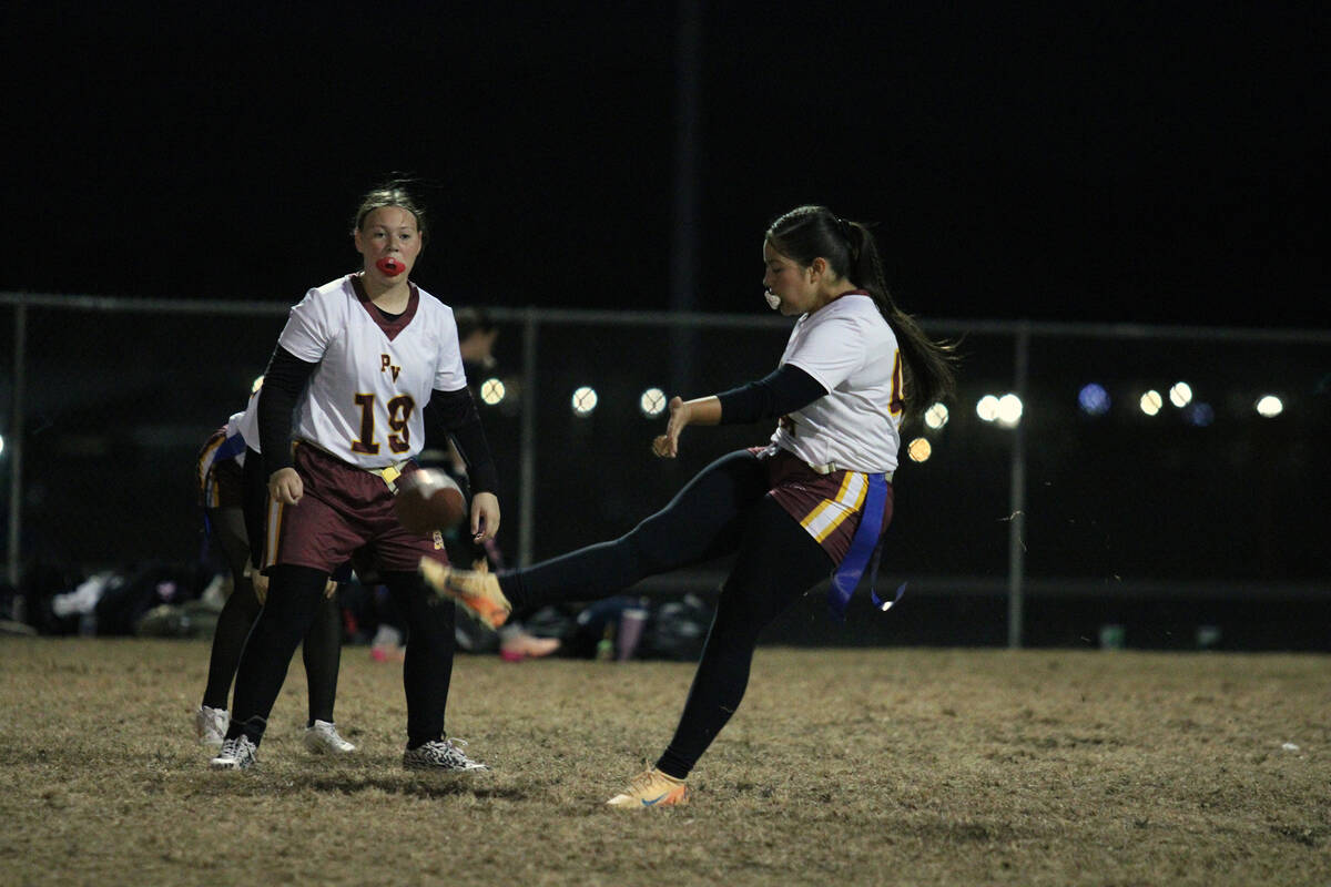 Pahrump Valley High School junior linebacker Jazmyn Herrera launches a ball deep during a punt ...