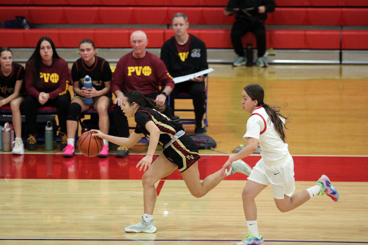 Pahrump Valley High School junior Autumn Colon flies down the court after recording a steal dur ...