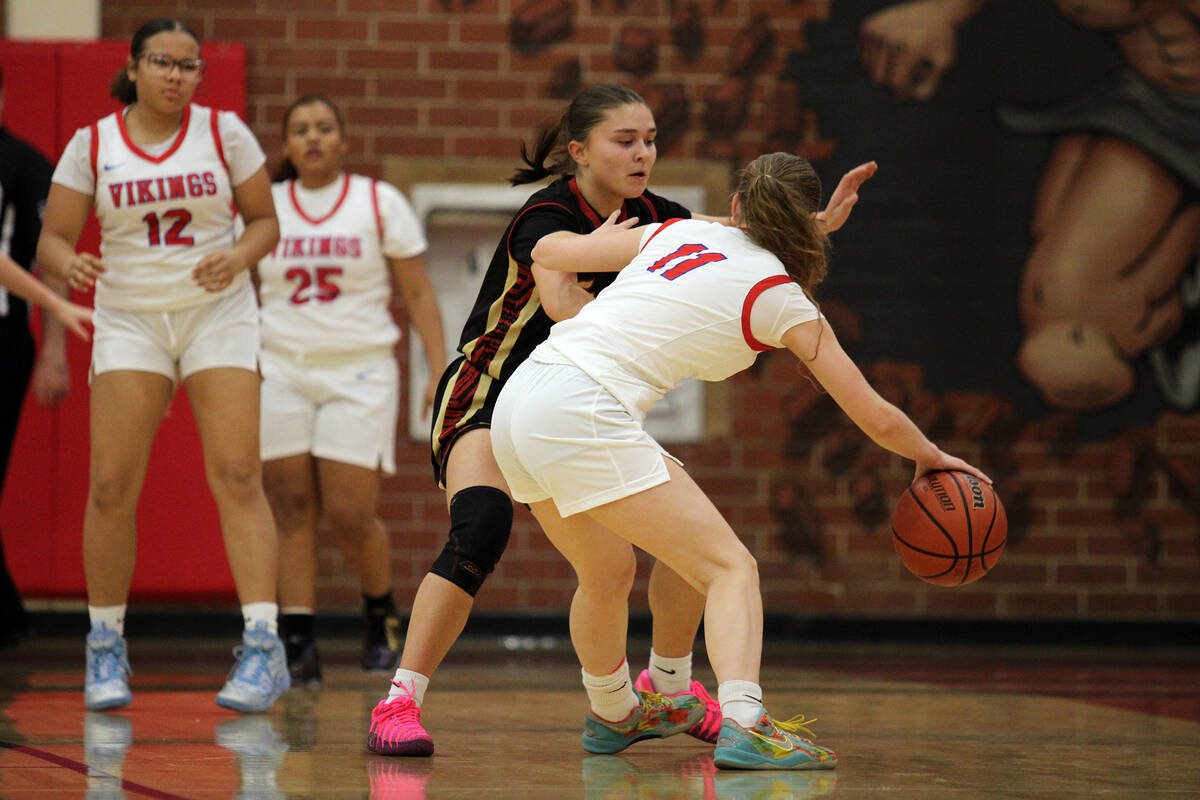 Pahrump Valley High School sophomore Aurora Bowers plays stiff defense on Valley High School se ...