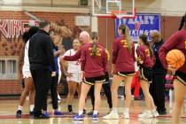 Pahrump Valley High School head coach Bob Hopkins greets opponents from Valley High School befo ...