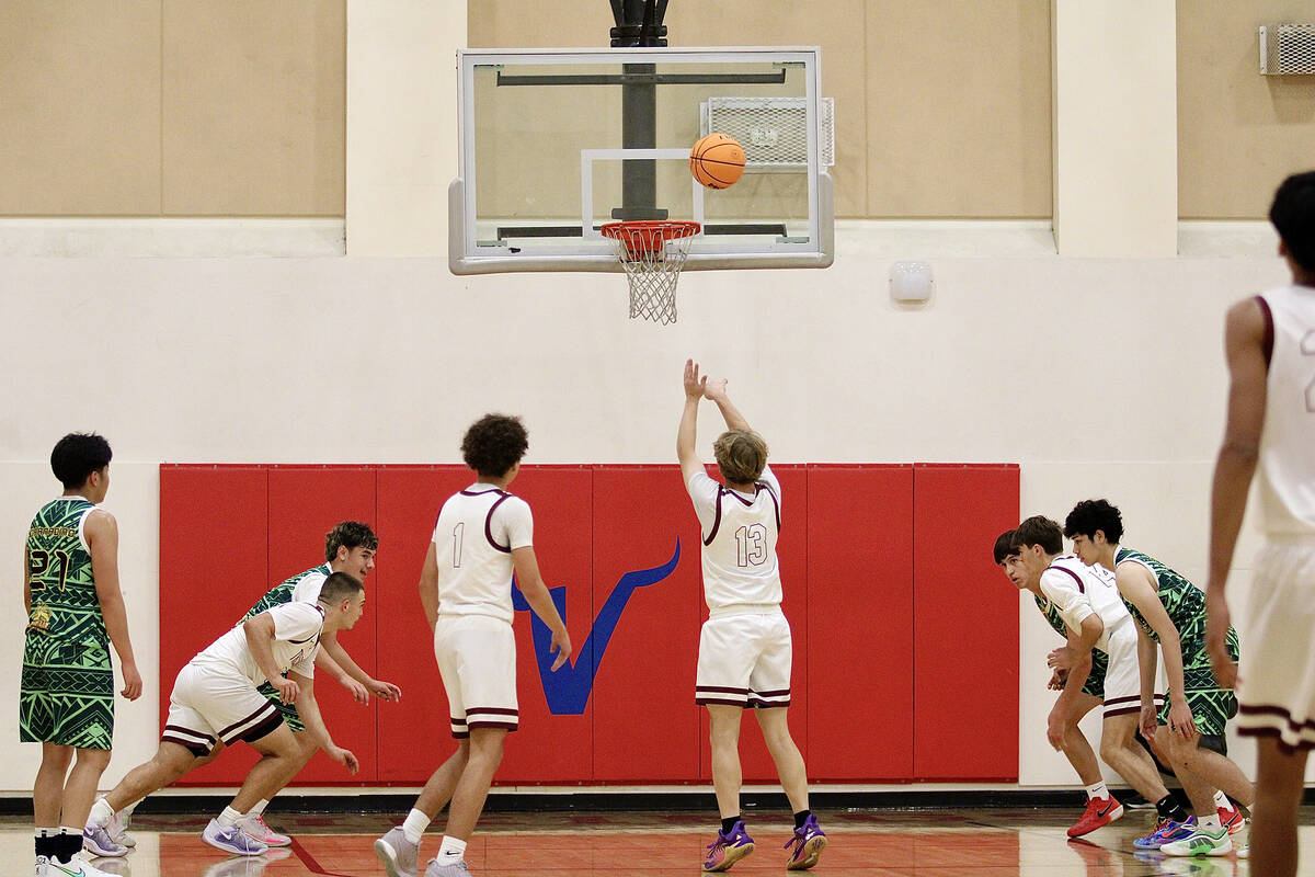 Pahrump Valley High School junior TC Hone is sent to the free-throw line against the 1st Nation ...