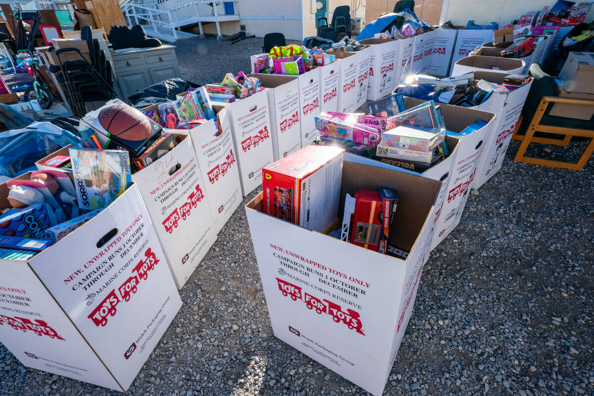 Boxes of toys, collected from Toys for Tots locations, were used to replenish the toy supply in ...