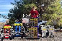 Pahrump local WORCS Racing champion Kroi Ryan proudly stands with his multiple WORCS championsh ...