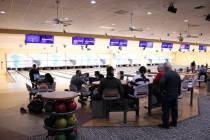 Bowlers wait for their turn on the lanes at the Nugget Bowl inside of the Pahrump Nugget Casino ...