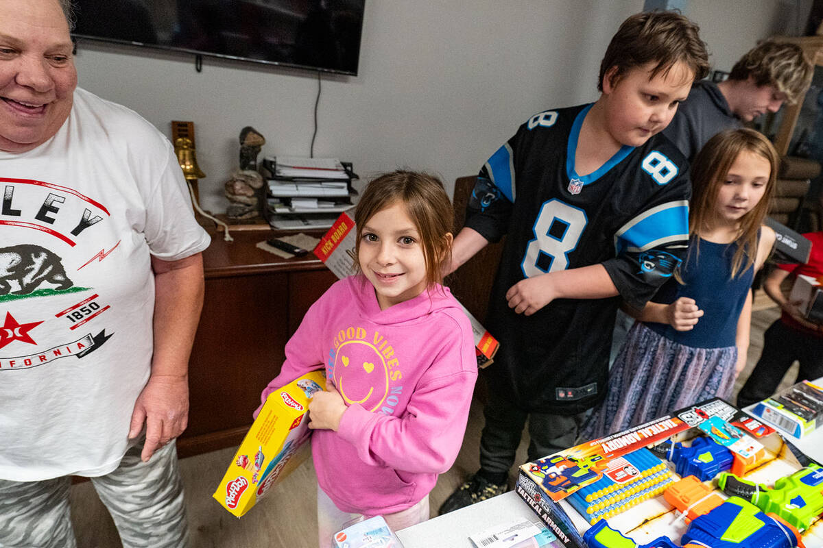 Families and groups were let into the Sheriff’s Office one by one so they could look at all t ...