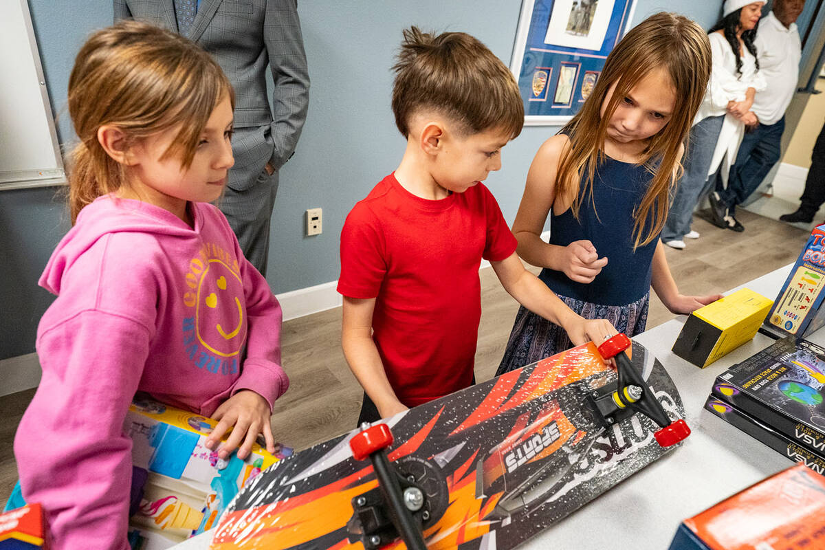 A diverse selection of toys was available for attendees, such as books, Lego sets, sports equip ...