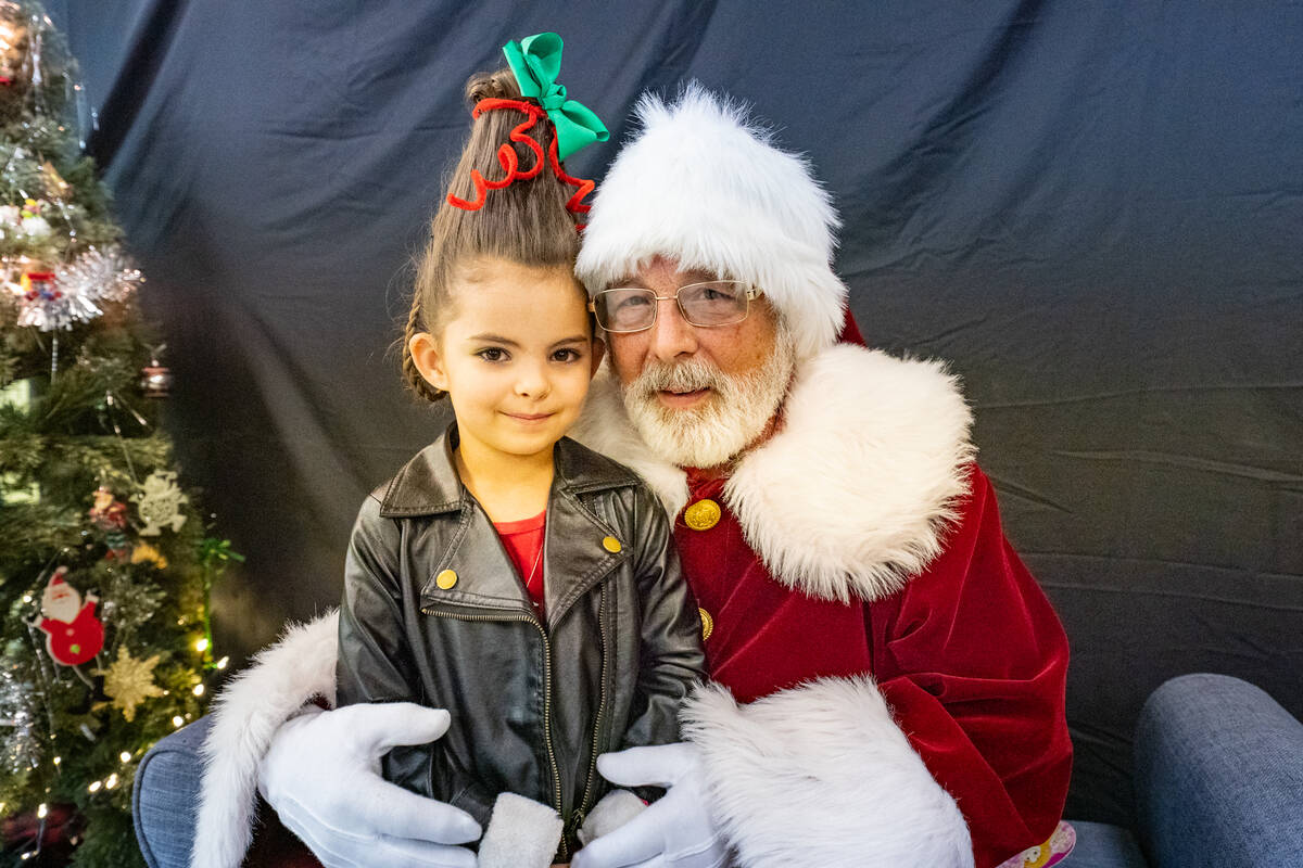 Shilyn Glibbon’s daughter Harper smiles on Santa’s lap. The Glibbons recently moved to Pahr ...