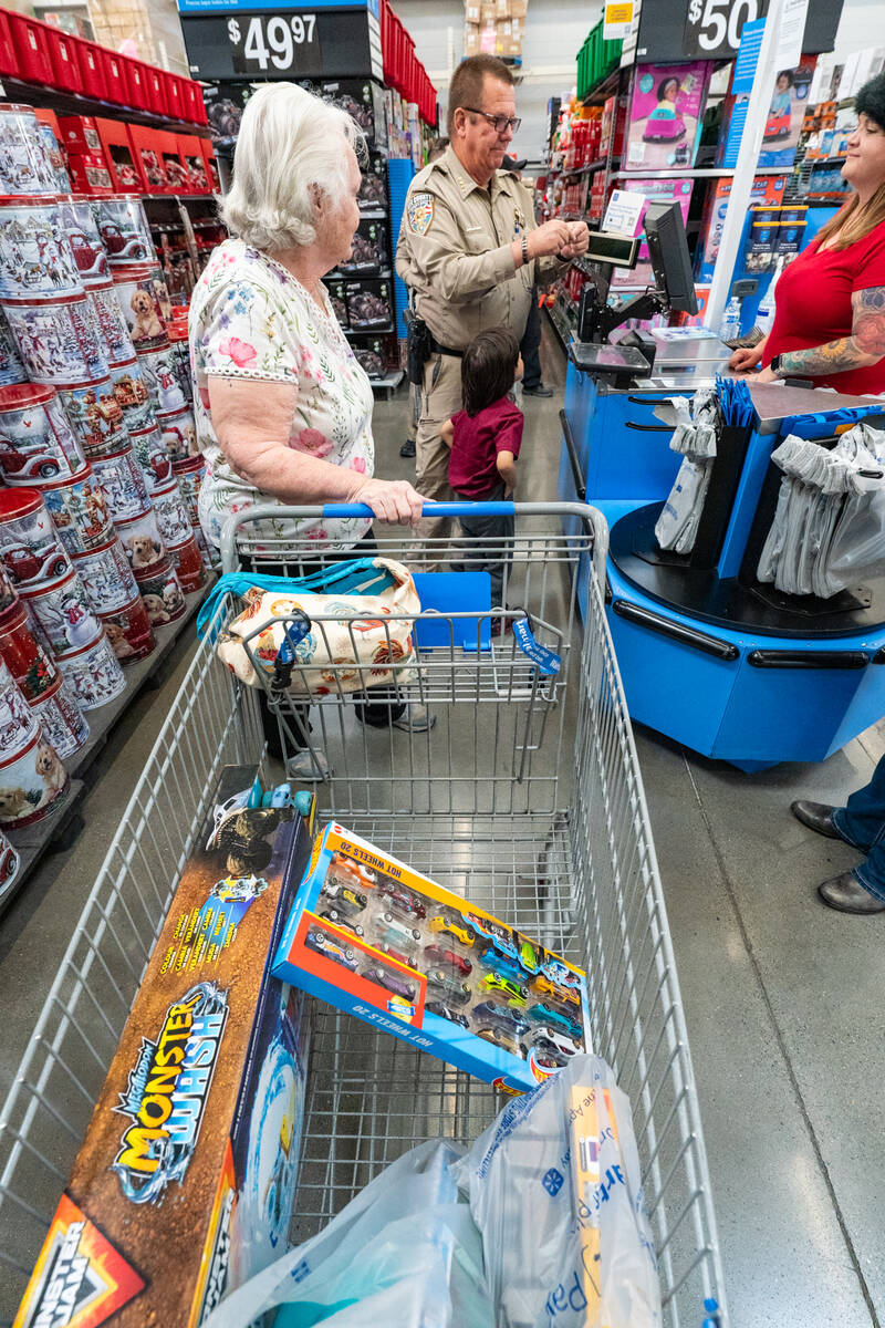 Sheriﬀ McGill in the checkout lane in Walmart’s Lawn and Garden area. Walmart opened this l ...