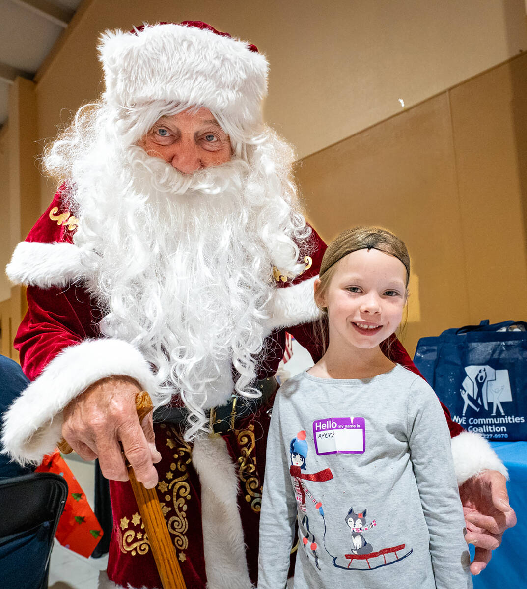 The man in the big red suit was in attendance at the Community Christmas Eve Dinner, where he s ...