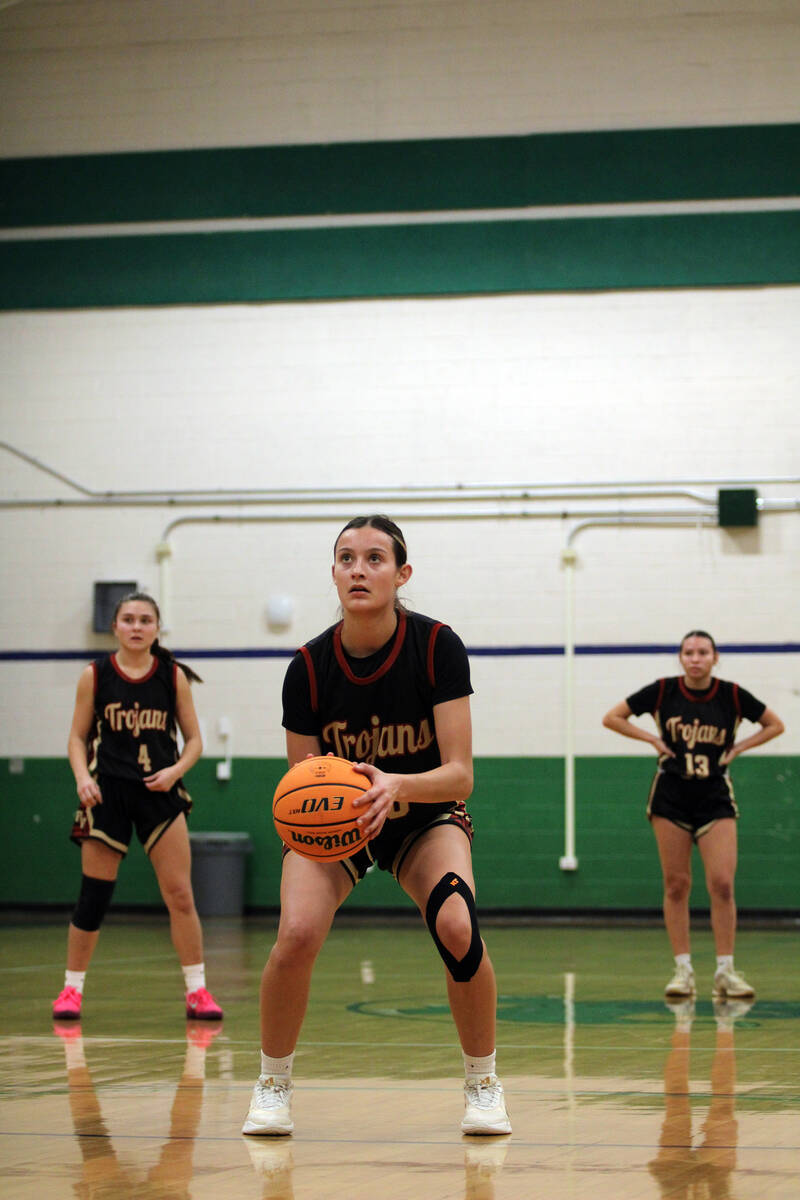 Pahrump Valley High School junior Riley Saldana is sent to the free throw line where she went 6 ...