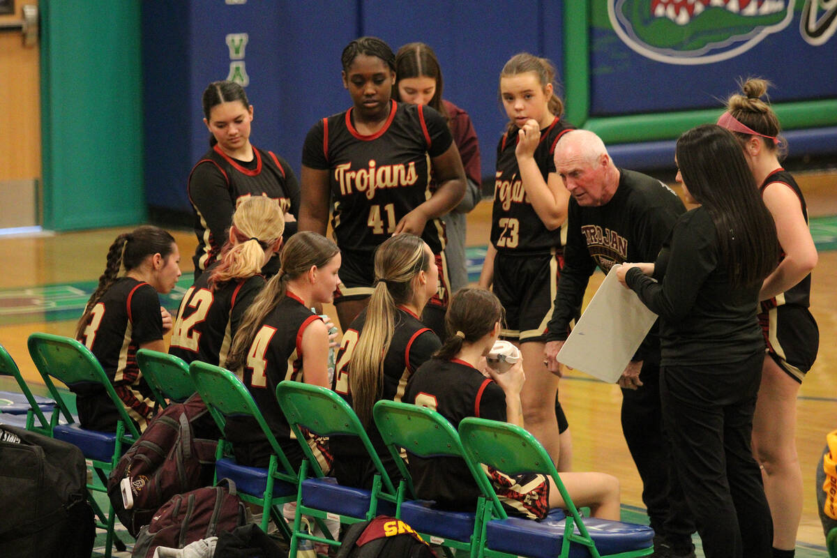Pahrump Valley High School Lady Trojans head coach Bob Hopkins delivers a strong message during ...