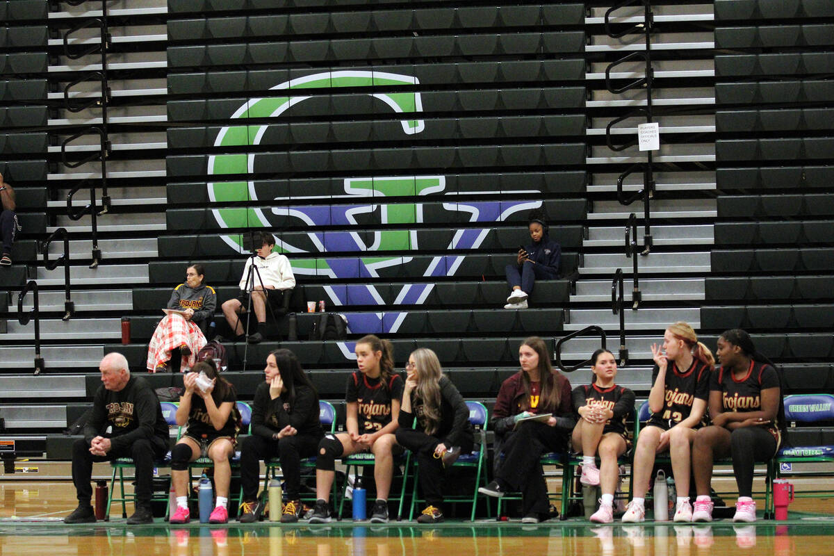 Pahrump Valley High School girls basketball coaches Bob Hopkins and Darla Sheppard look on with ...