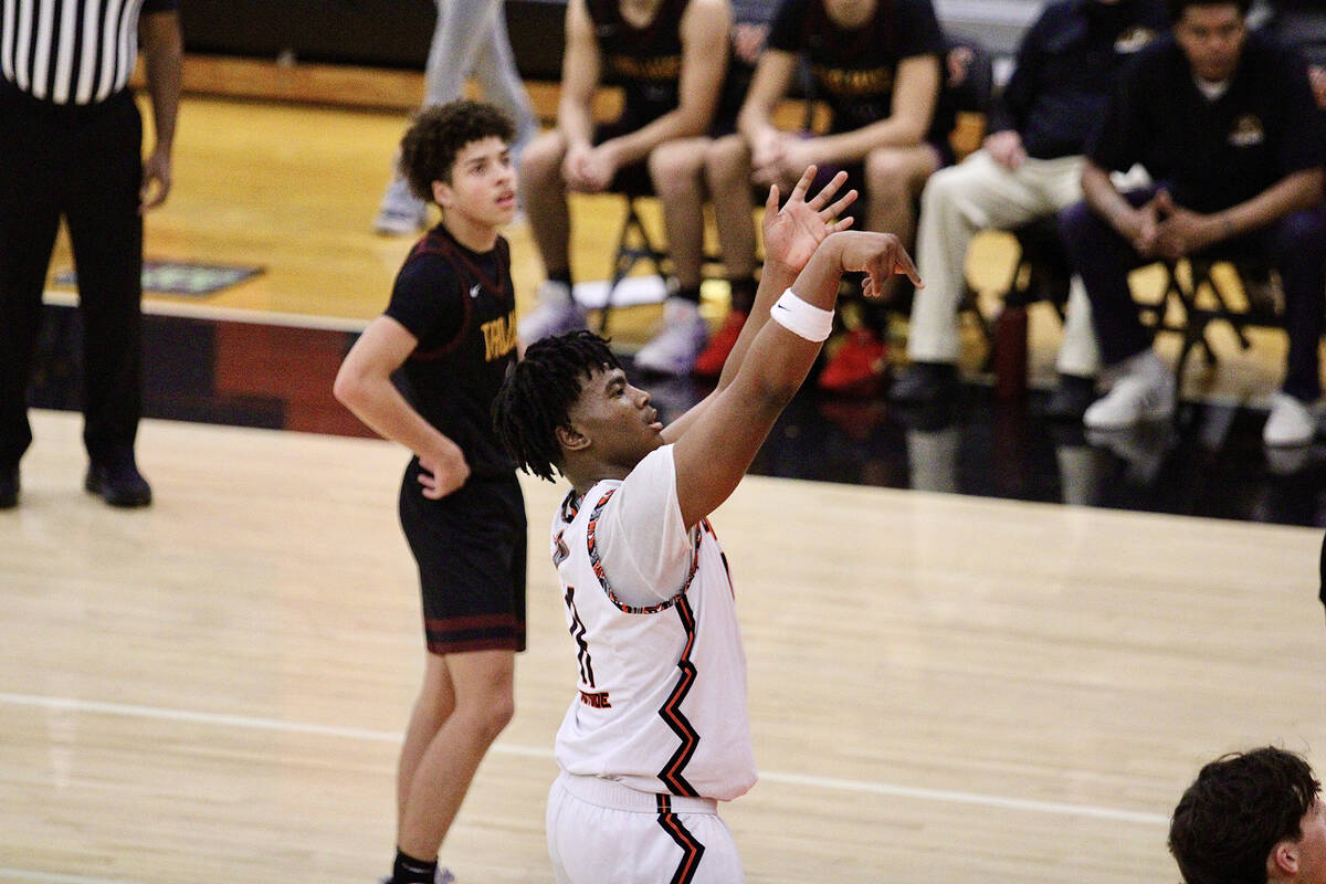 Chaparral High School junior guard Micah Jones is sent to the free-throw line against Pahrump V ...