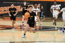 Pahrump Valley High School senior Keir Sheppard advances on a breakaway opportunity against Cha ...
