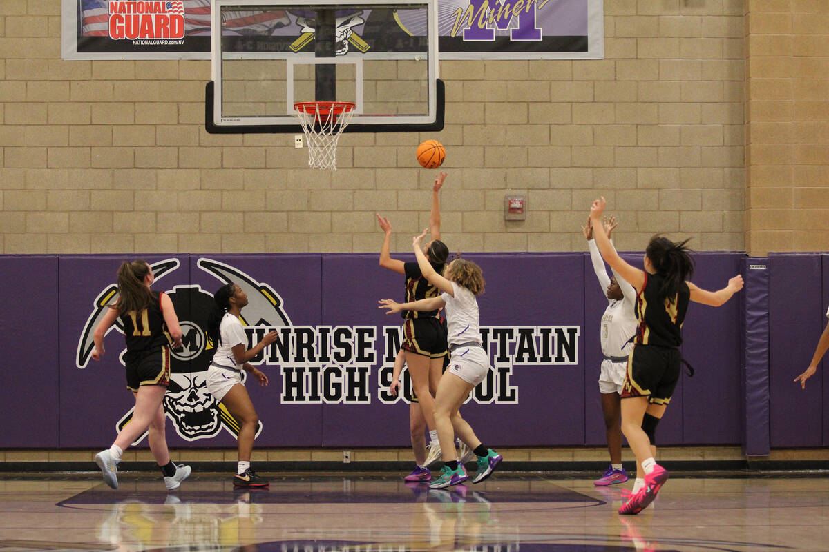 Pahrump Valley High School junior Riley Saldana converts a successful layup attempt against Sun ...