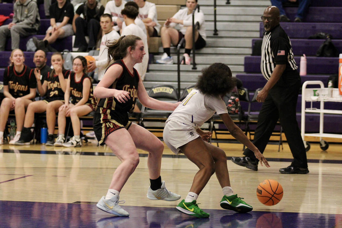 Pahrump Valley High School sophomore guard Kaitlyn Brown plays good man defense on Sunrise Moun ...