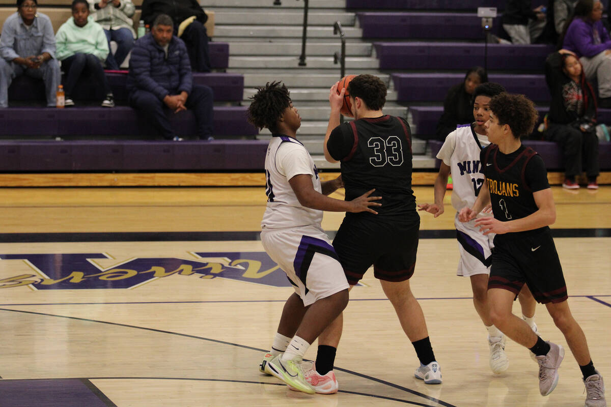 Pahrump Valley High School junior Luca Gavenda looks to dish out a pass to teammate junior Trae ...