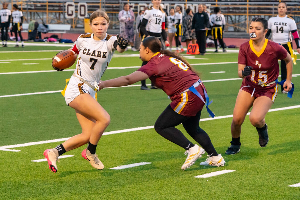 Pahrump Valley High School senior LB/WR Leah-Marie Cooper attempts to get a hand on Clark High ...