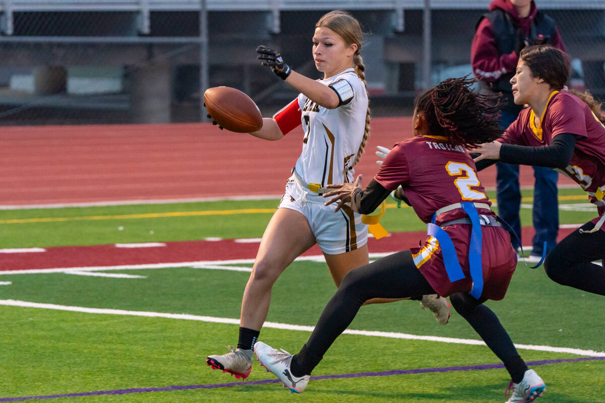 Pahrump Valley High School senior wideout Diona Nixon attempts to make a stop on Clark High Sch ...