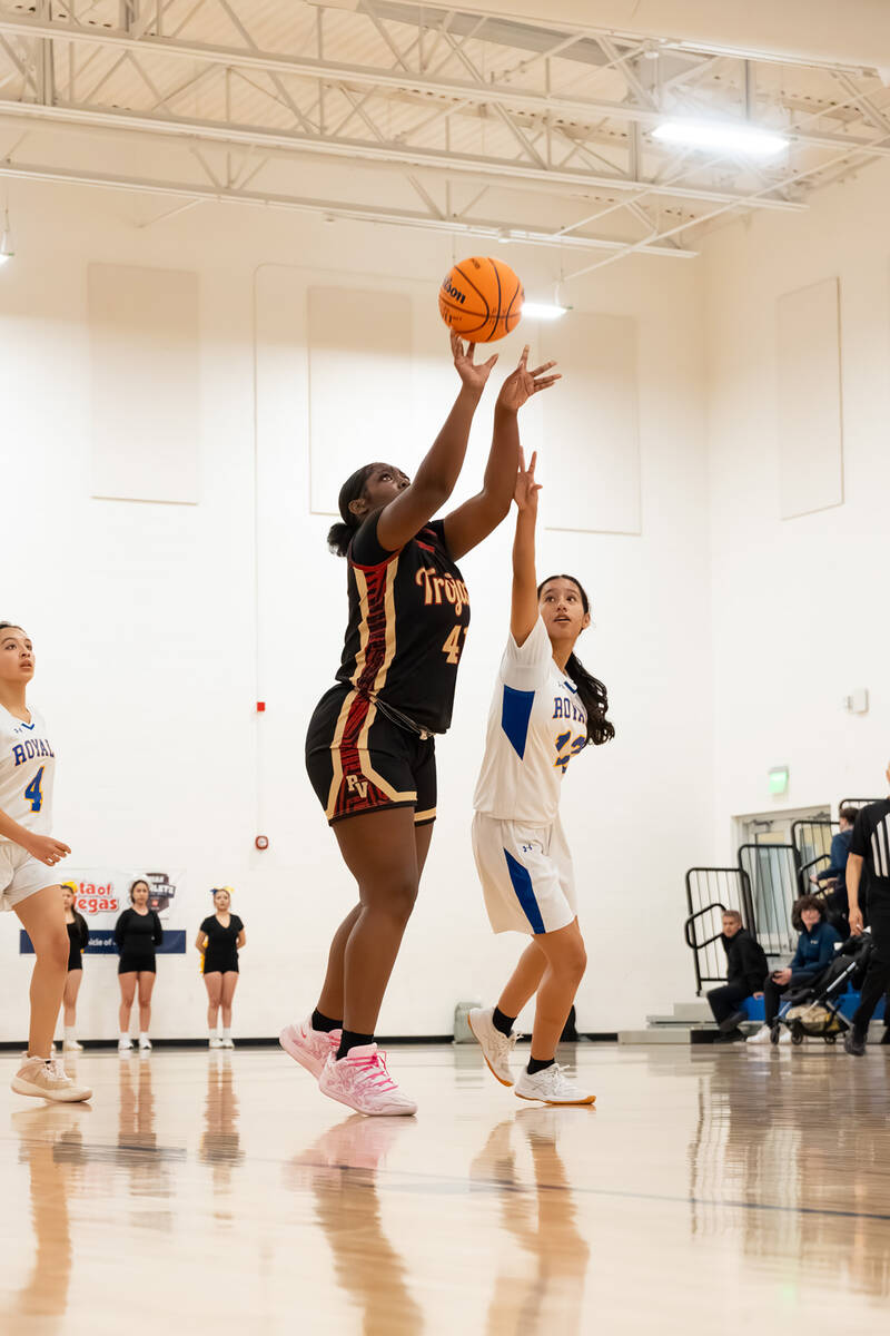 Pahrump Valley High School sophomore Adrian Rogers secures ball control against Cristo Rey St. ...