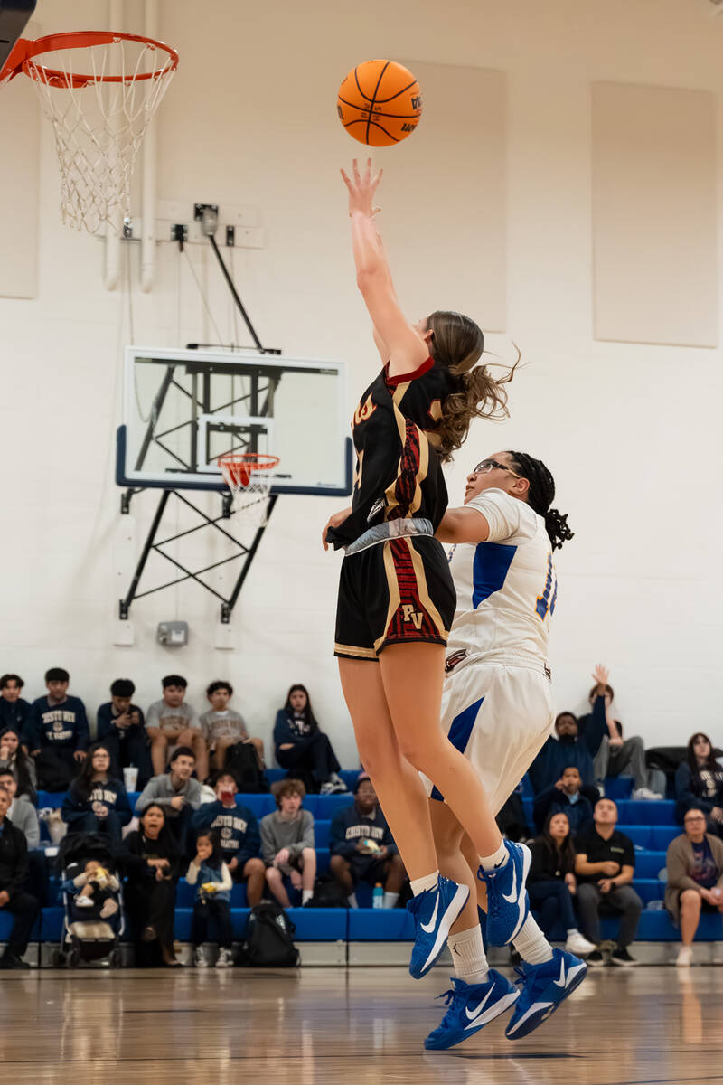 Pahrump Valley High School girls basketball sophomore Ella Odegard attempts to convert a layup ...