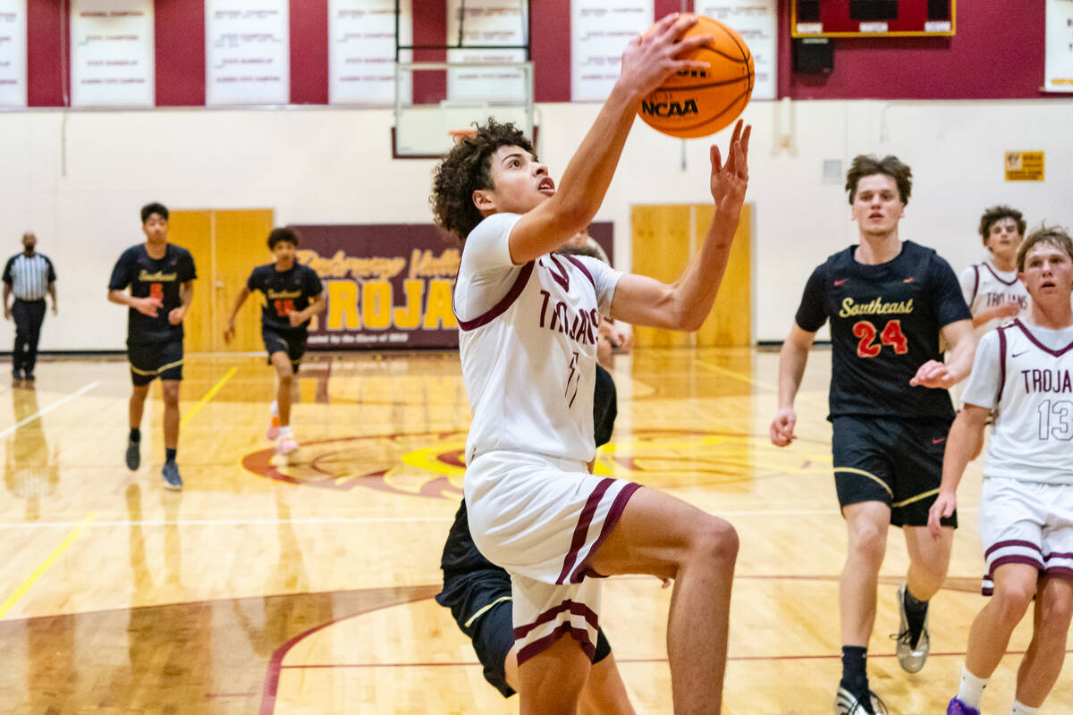 PVHS junior Trae Plein drives in for a layup opportunity against SECTA at home in a non-league ...