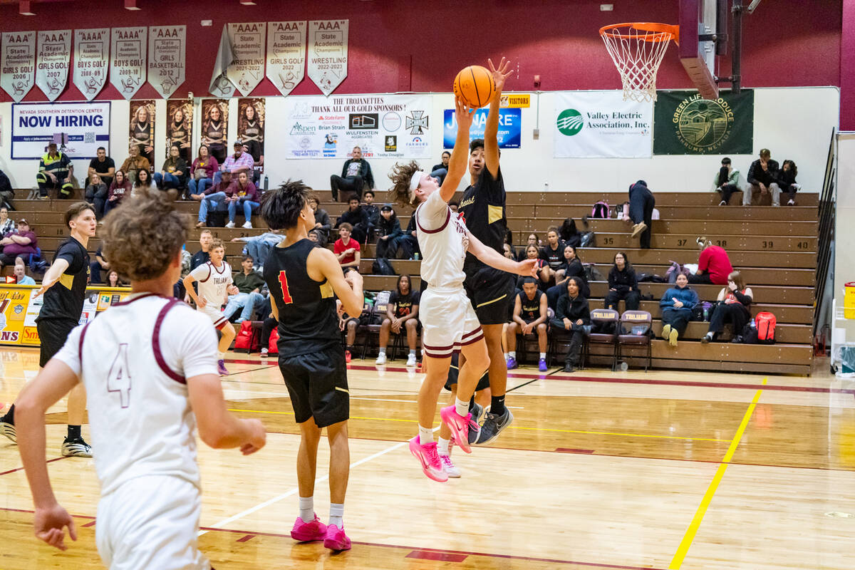 PVHS junior Lucas Gavenda puts up a layup against SECTA during the Trojans' 74-61 loss at home. ...