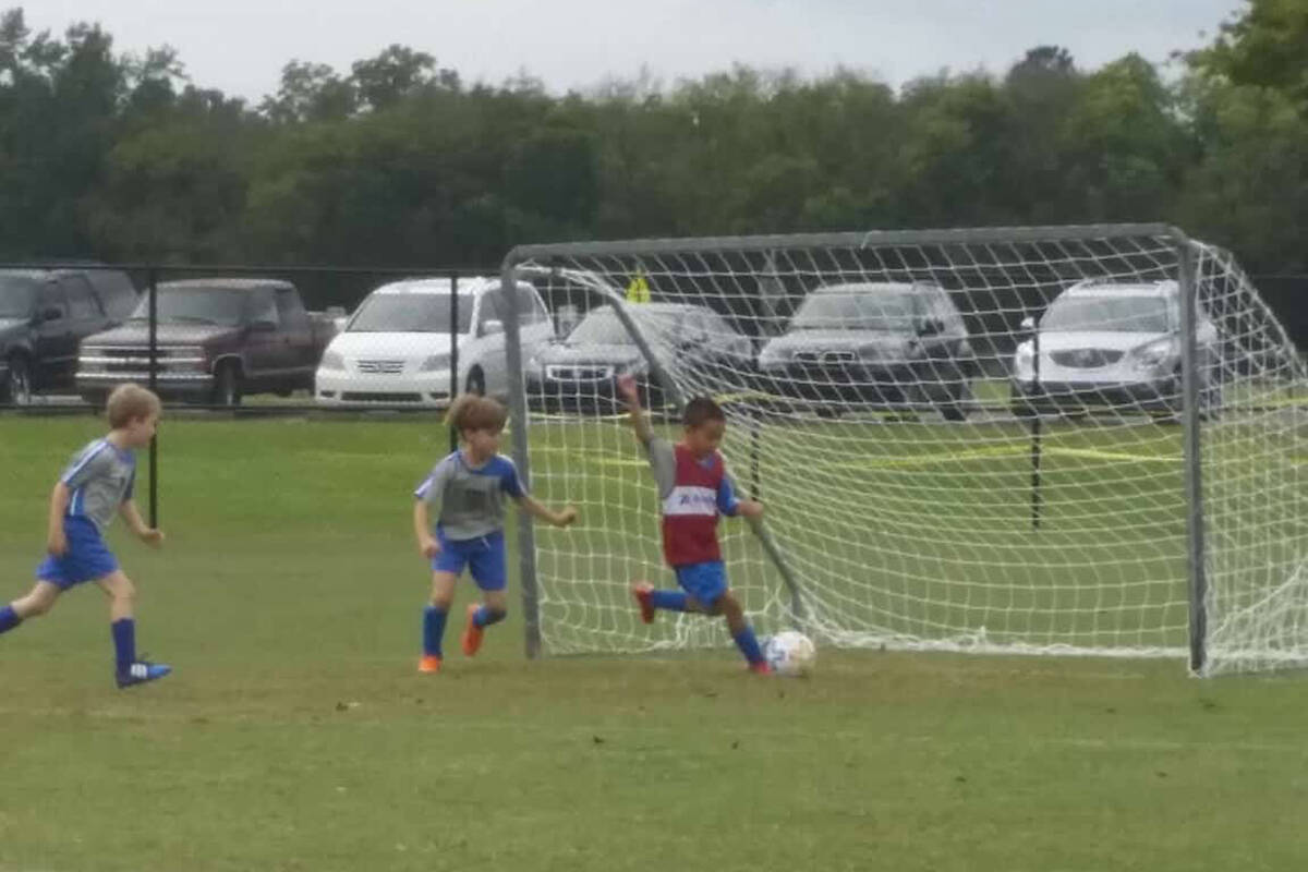 Cayden Cowley clears the ball out of his goal as a young kid playing AYSO for the Pahrump Shark ...