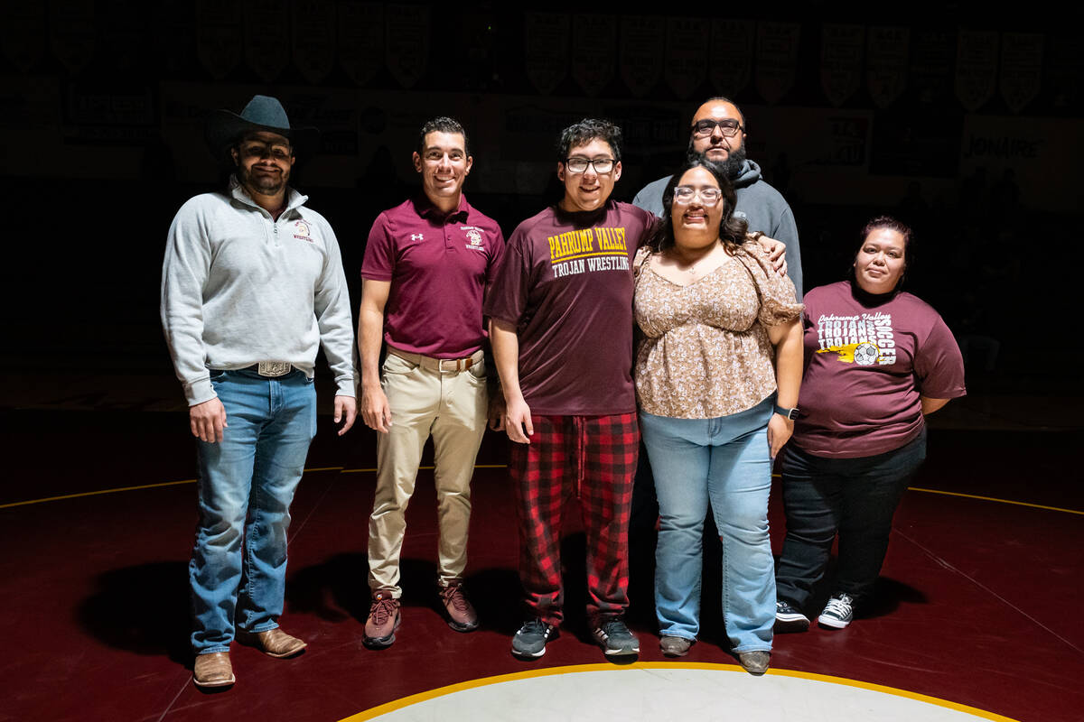 Pahrump Valley High School senior Marlon Garcia is honored alongside family and wrestling coach ...