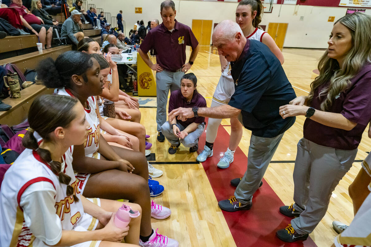 Pahrump Valley High School varsity girls basketball head coach Bob Hopkins tries to go over a n ...
