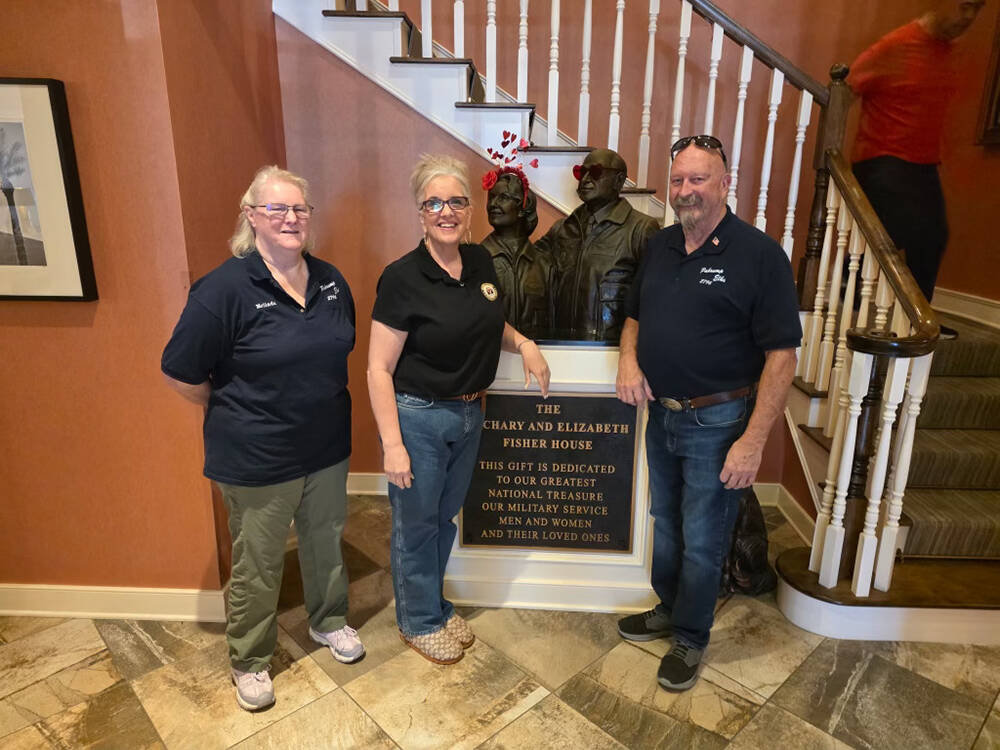 Stephani Jo Wheeler, manager at Fisher House, was pleased to accept a donation of $1,800 from t ...