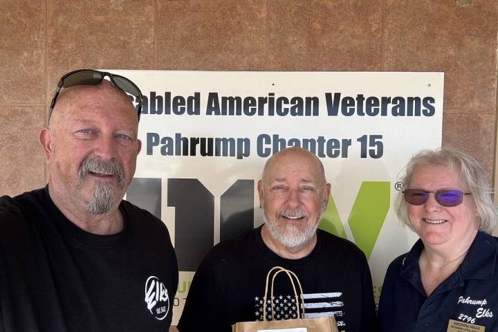 Pahrump Elks Exalted Ruler Pete Kurylowicz, left, and Elks Loyal Knight Melinda Mills, right, p ...