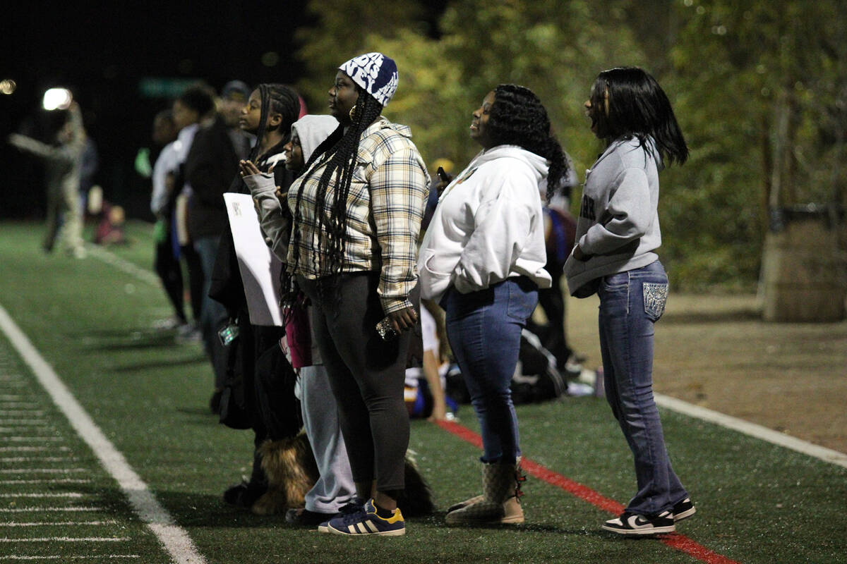 Pahrump Valley High School flag football fans in attendance carried homemade signs and positive ...