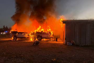 Pahrump Valley Fire and Rescue extinguished a motorhome and wooden garage fire on Thursday, Jan ...