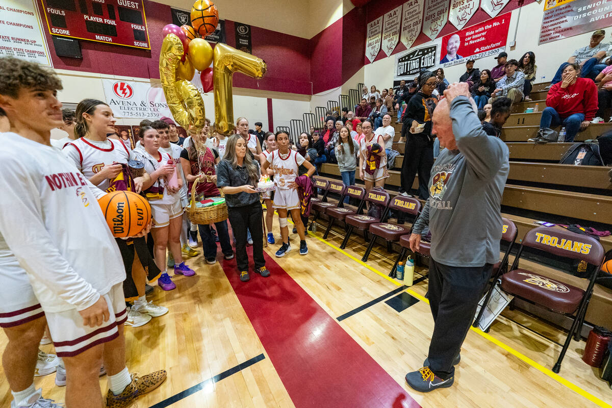 Pahrump Valley High School longtime head coach Bob Hopkins is honored by the girls and boys var ...