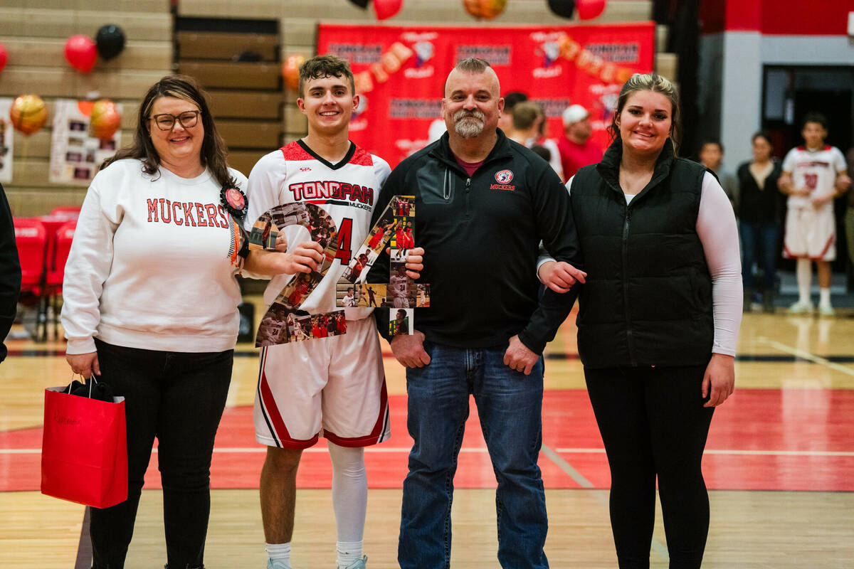 Tonopah High School senior Remington Cobb is honored before his senior night home game against ...