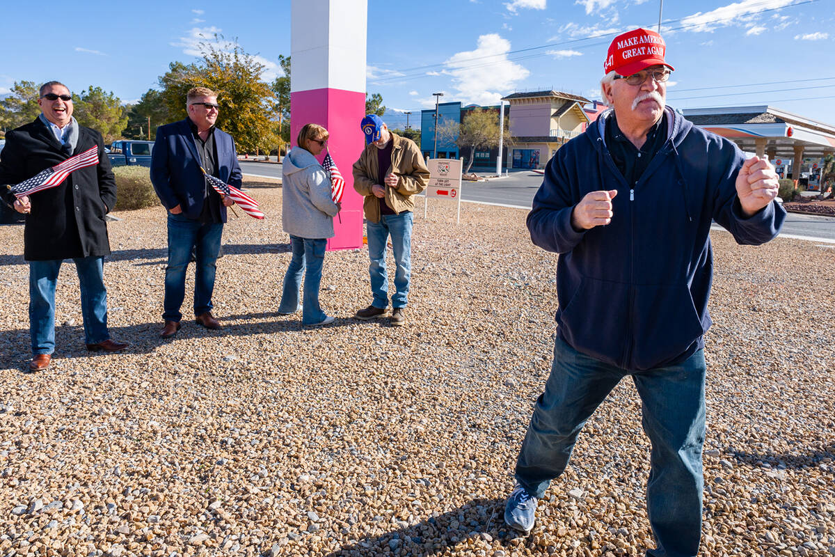 Nye County Republican Club President Joe Burdzinski shows off his Donald Trump dance moves at t ...