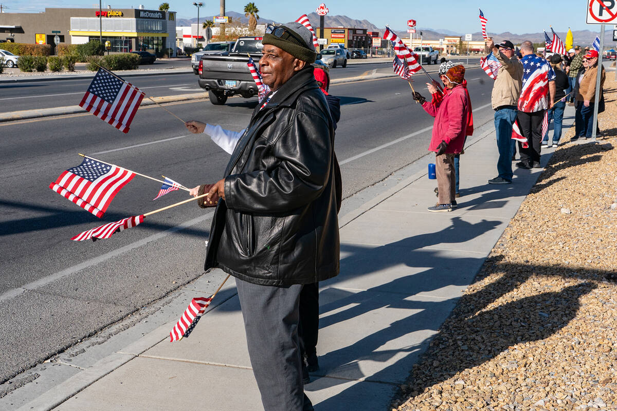 Many of the attendees at the pro-Donald Trump and pro-law enforcement rally held American flags ...