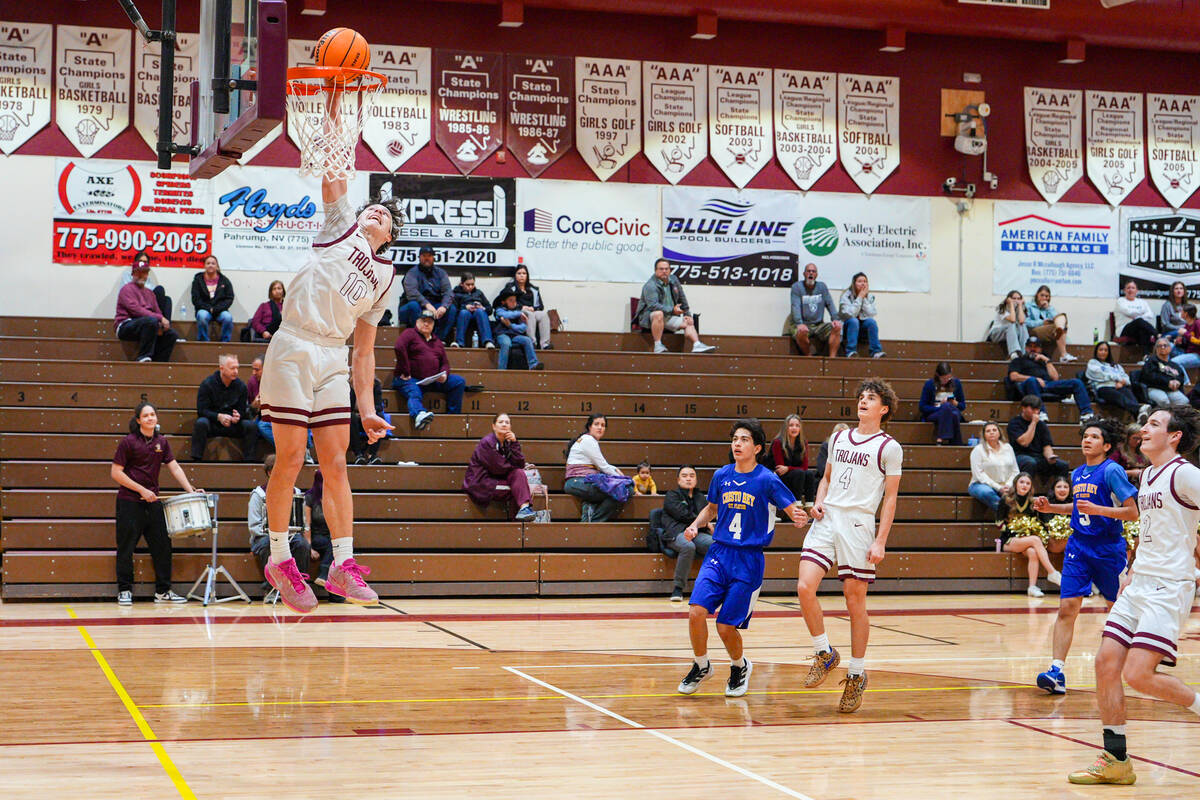 Pahrump Valley High School junior and team leading scorer Lucas Gavenda gets some air time agai ...