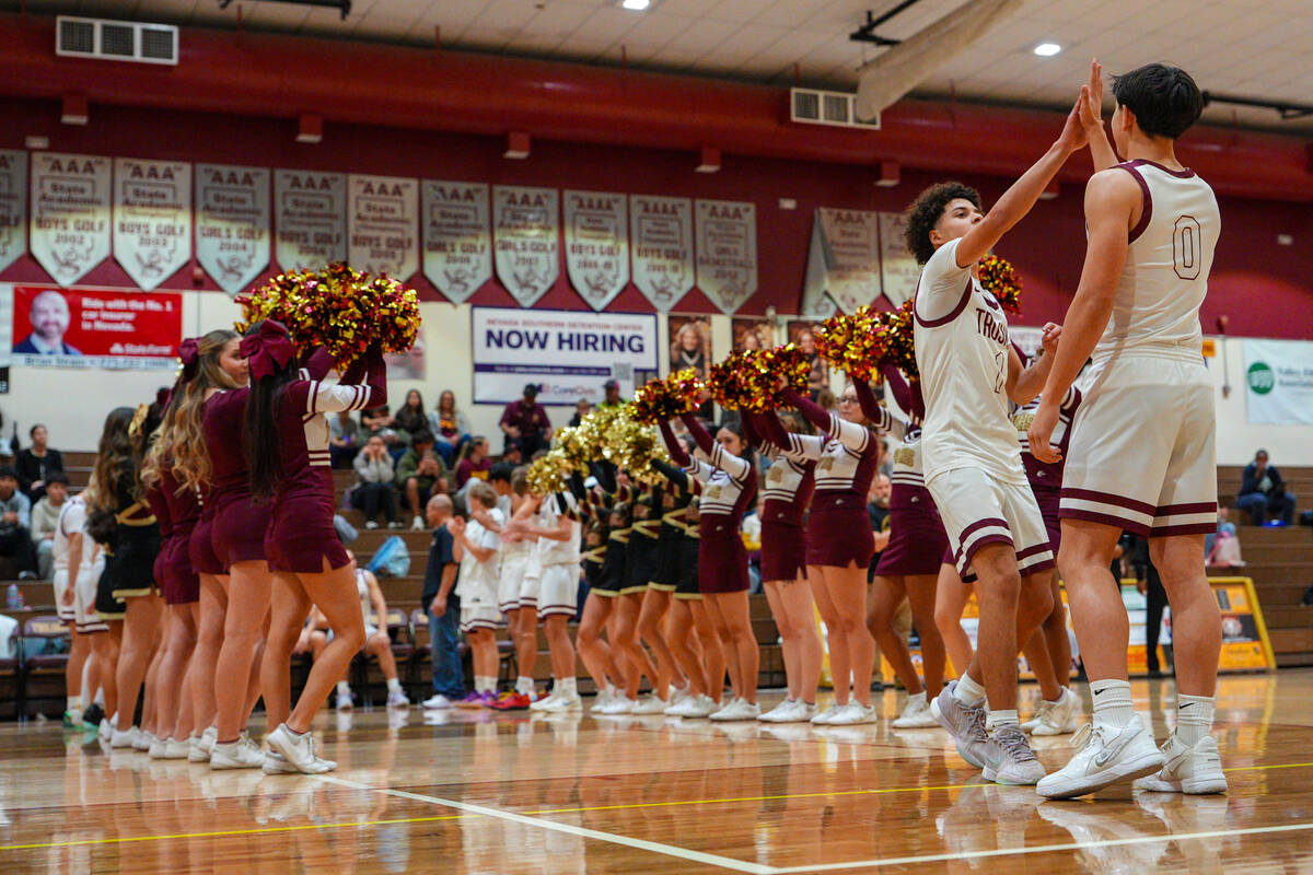 Pahrump Valley High School's Trae Plein and Levi Denton celebrate together during pre-game acti ...