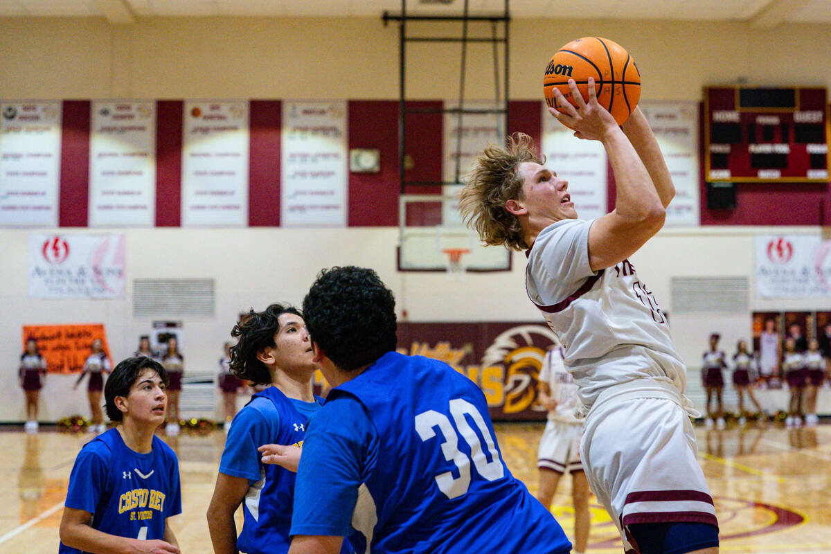 Pahrump Valley High School junior TC Hone goes up for the jumper against Cristo Rey St. Viator ...