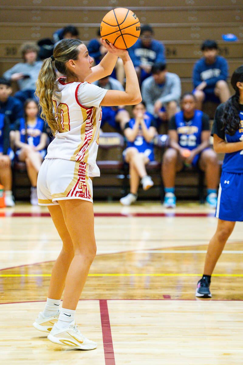 Pahrump Valley's leading scorer, junior Riley Saldana, steadies her breath to knock down a free ...