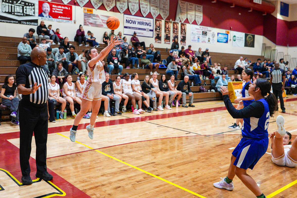 Pahrump Valley High School sophomore Kaitlyn Brown lets one fly from beyond the arch against Cr ...